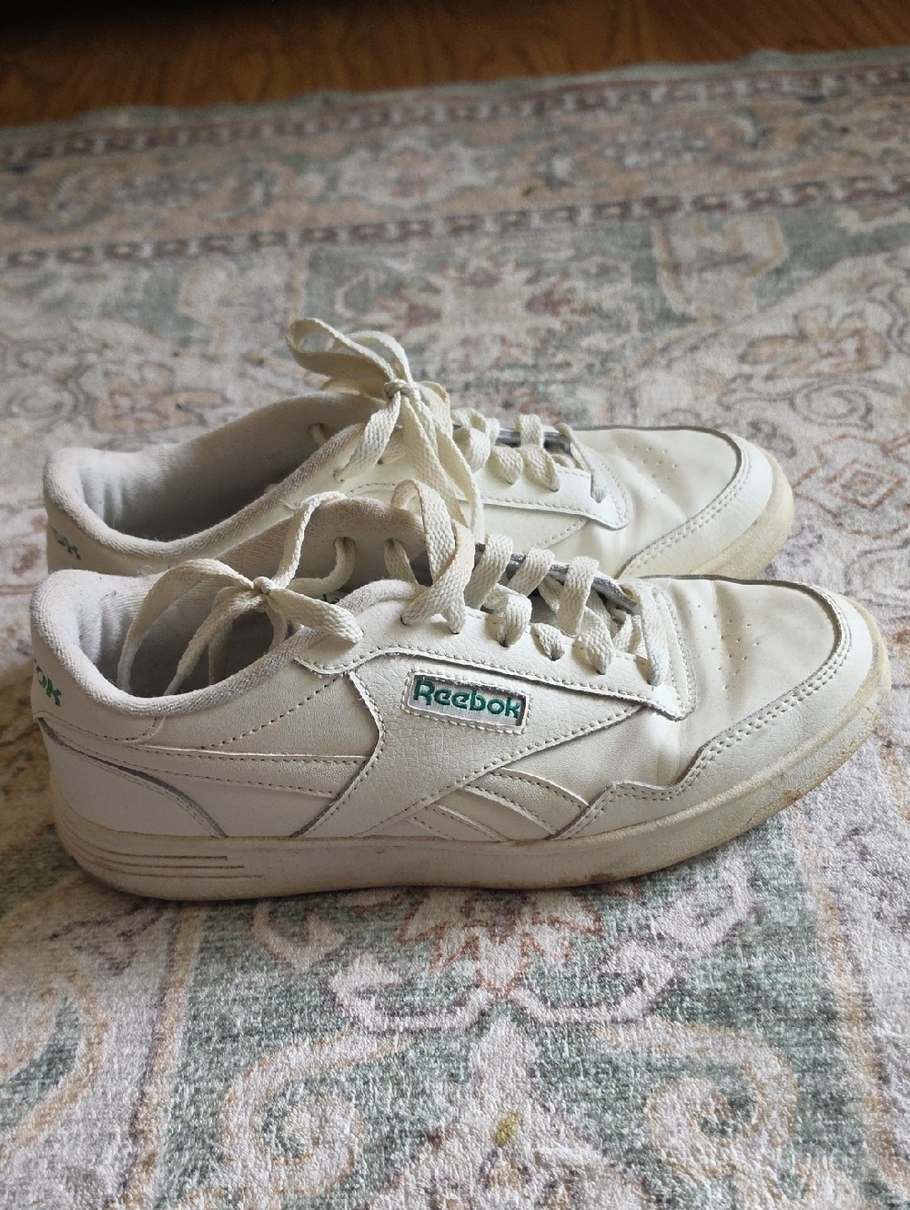 Reebok White Leather Sneakers with Green Logo Accent